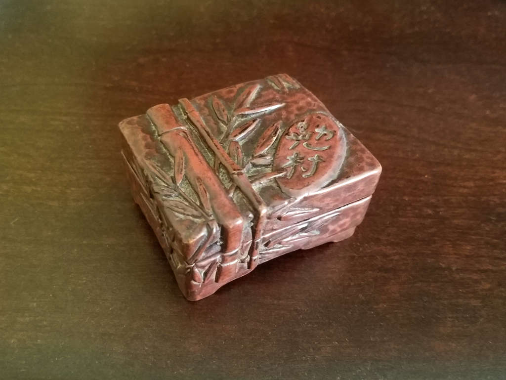 A small Carved Music Box closed