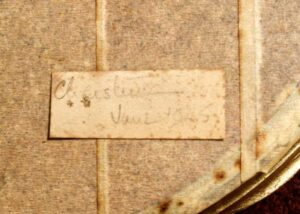 Katie White Drawing Signature cut out and attached to Back 1947