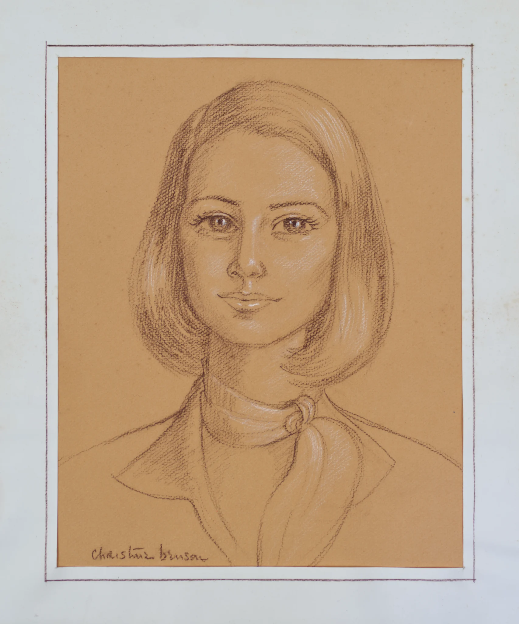 Quick sketch of a young woman done with conte crayon on a light brown paper