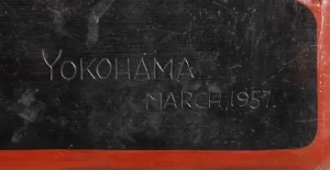 Large carved wooden tray depicting Cherry tree blossoms reverse side label Yokohama, March 1957